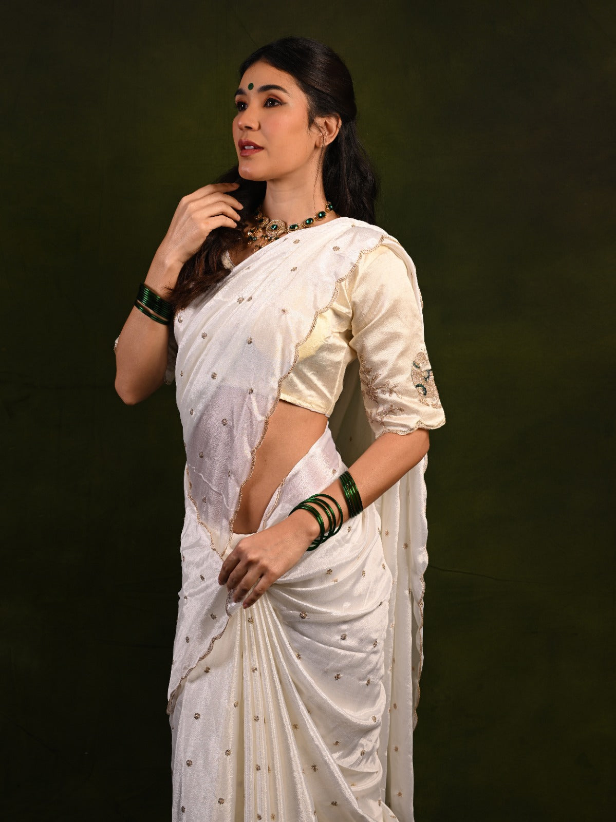 Chinon fabric saree with sequence work, offering a soft and lightweight drape with a shimmering finish
