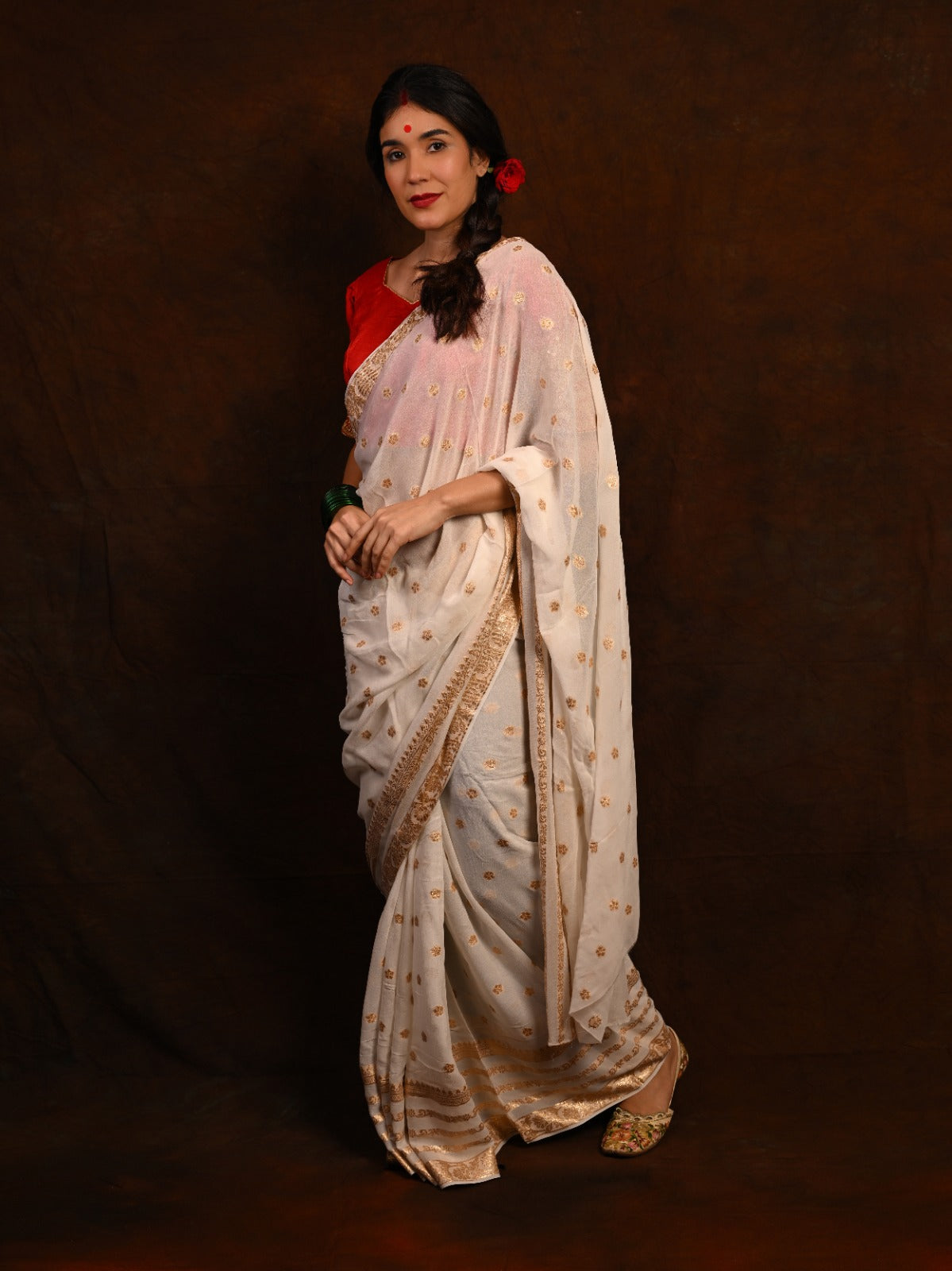 Front view of the Viscose Georgette Saree paired with an embroidered silk blouse